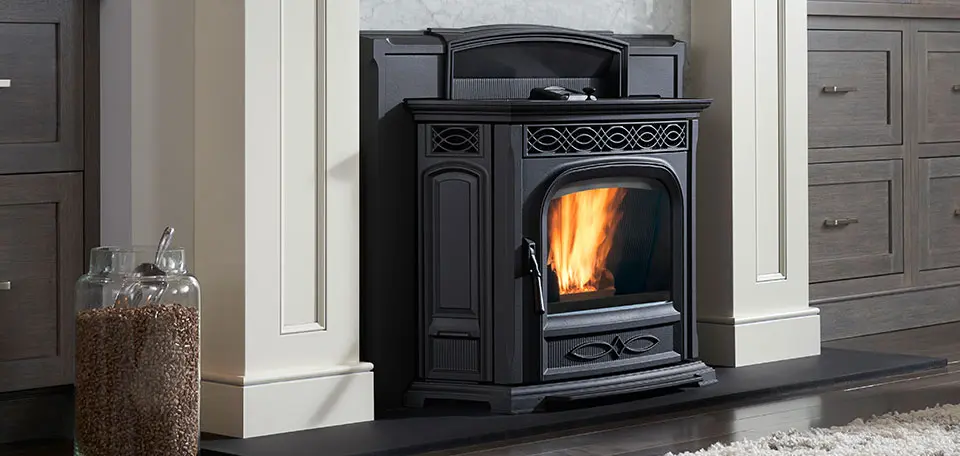 Fireplace insert installed in an open hearth by The Tin Man team